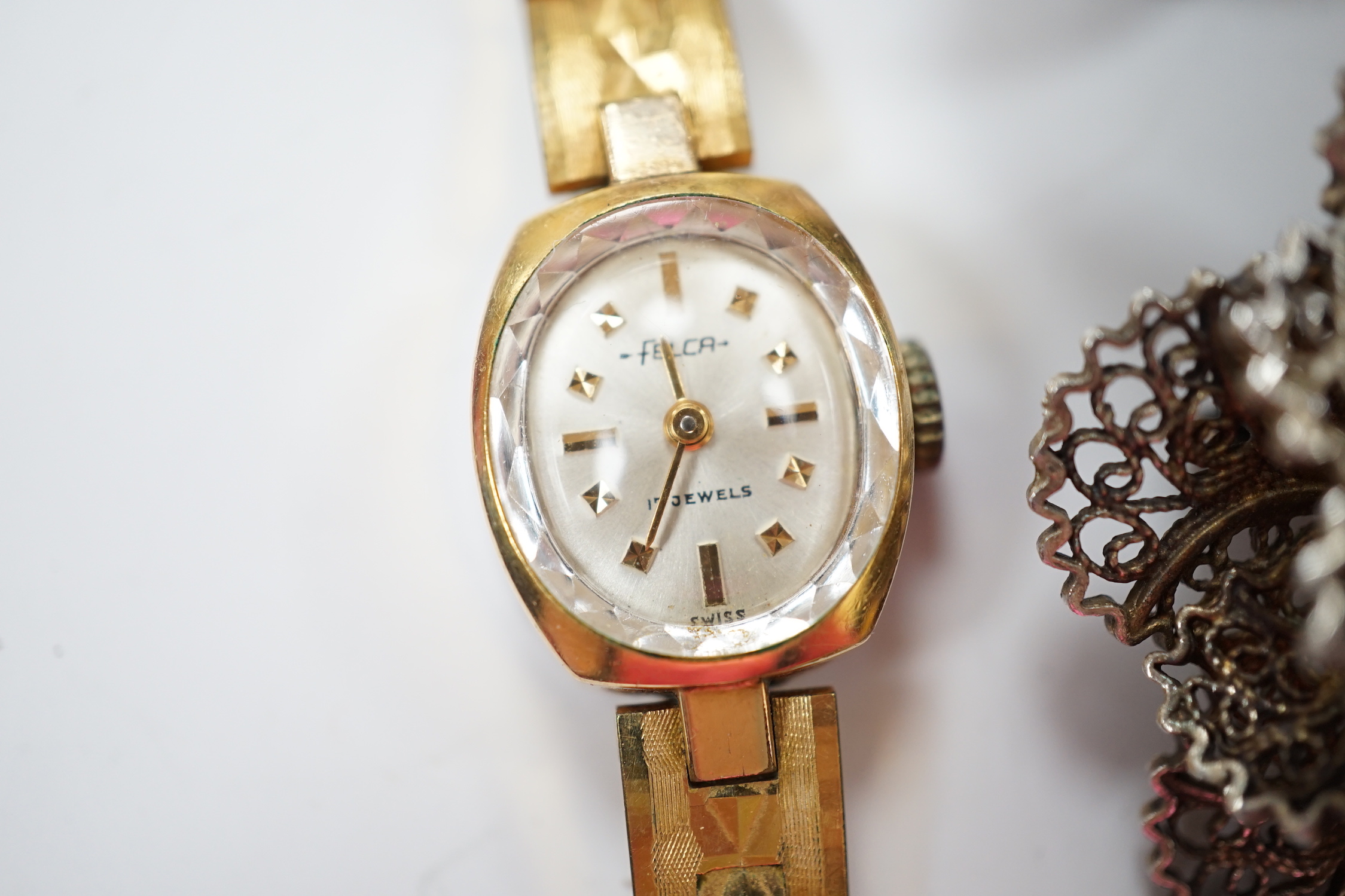 A silver and cabochon set dress ring, mixed costume jewellery and a lady's wrist watch.